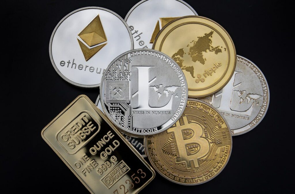Crypto coins lying besides gold