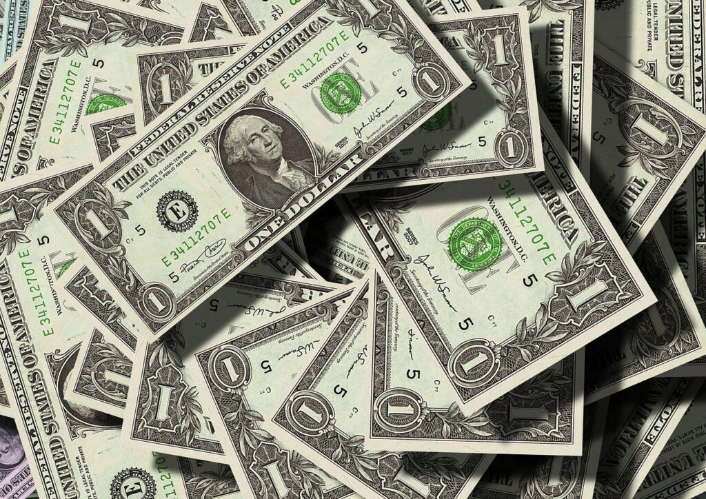 Dollar bills lying on each other