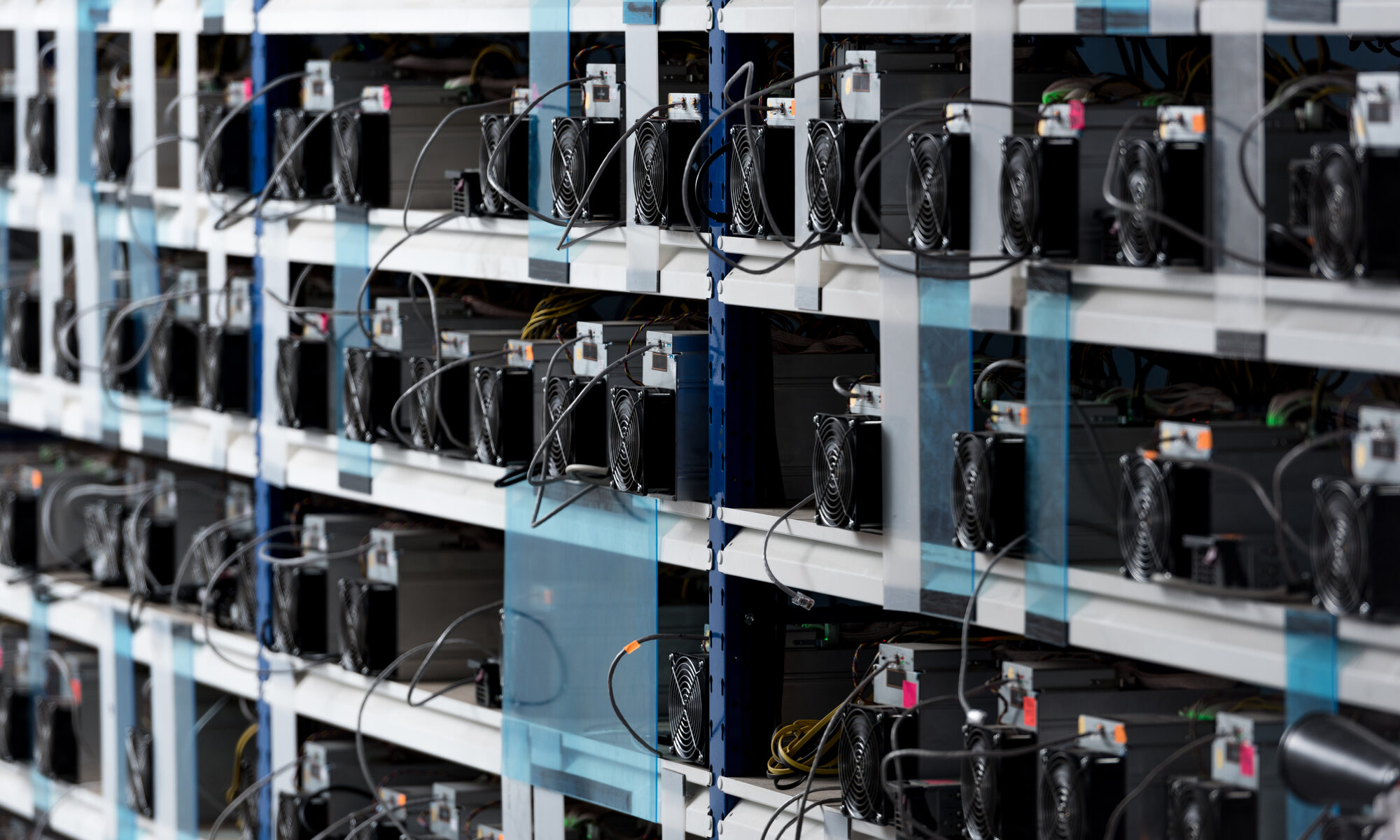 Several mining rigs are st up to mint fresh Bitcoins.