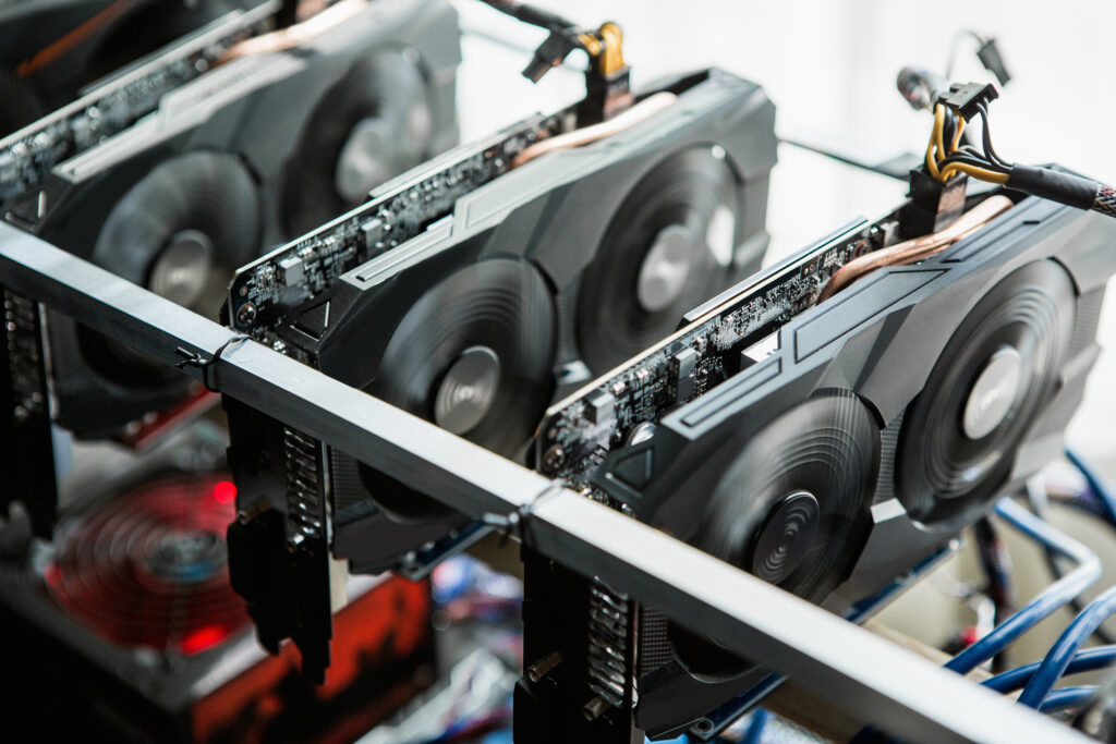 Graphic cards aligned in a mining rig to mint fresh bitcoin.